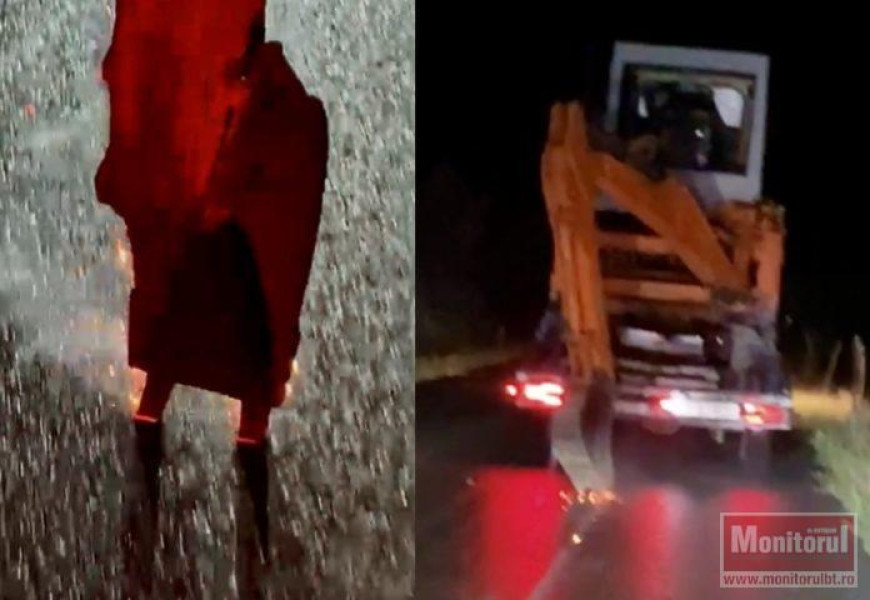 Un excavator degradează intenționat asfaltul pe un drum din județul Botoșani