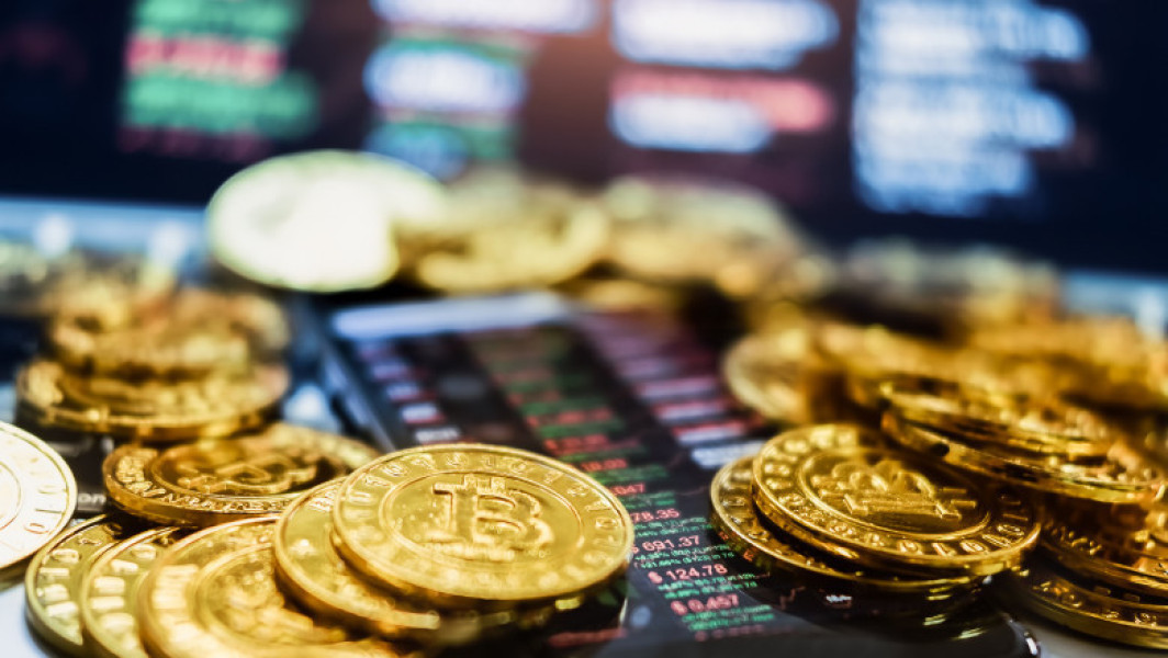 Descinderi în cinci țări europene pentru destructurarea unei rețele de fraudă cu criptomonede